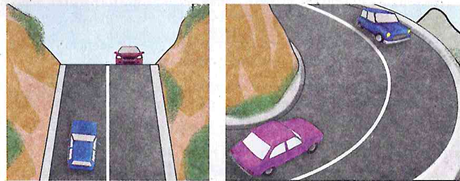 The continuous white line on this hill or this bend confines approaching vehicles to their proper sides, preventing collision where sight distance is insufficient to allow for avoiding action if they were using the same traffic lane.