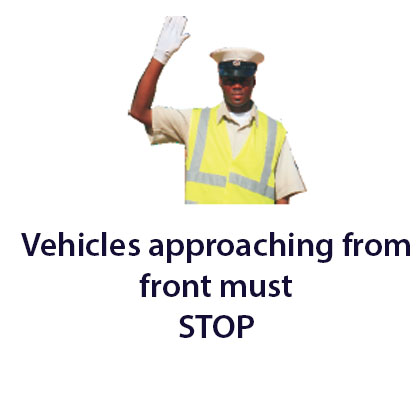 Traffic control officer - Zimbabwe police signals road sign