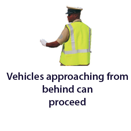 Traffic control officer - Zimbabwe police signals road sign