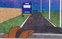 The warning triangle stands on the road behind the vehicle, 30 m to 50 m back.